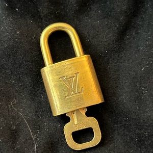 #308 Louis Vuitton Lock and key